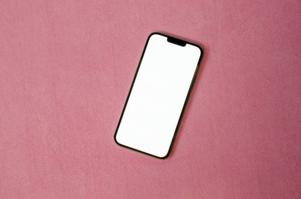 istock mobile phone with white screen top view, on marsala color background 1453825446