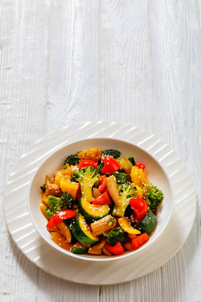 istock veggies stir-fry with thick soy based sauce 1453825662