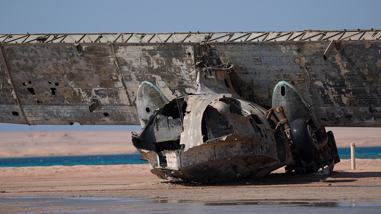 the wreck of an old airplane abandoned on the beach in the north of Saudi Arabia