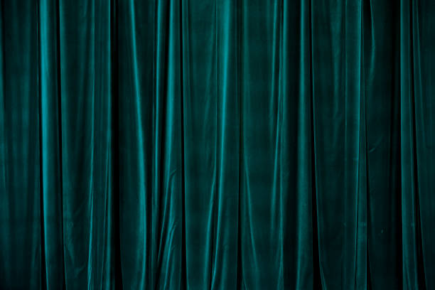 istock Teal curtain in theatre. 1453831144