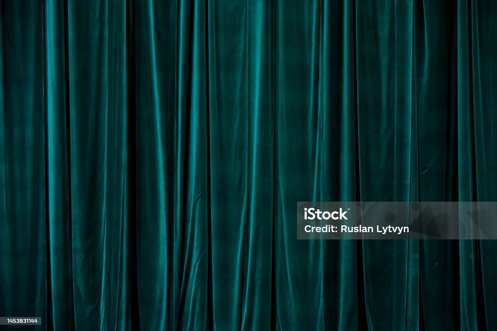 Teal curtain in theatre. Teal curtain in theatre. Textured background Curtain Stock Photo