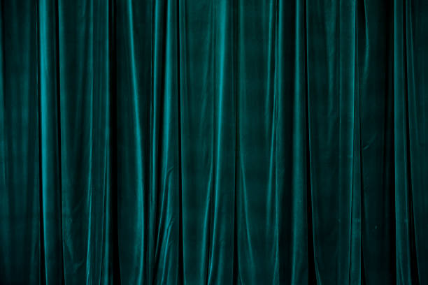 Teal curtain in theatre. Teal curtain in theatre. Textured background velvet curtain stock pictures, royalty-free photos & images