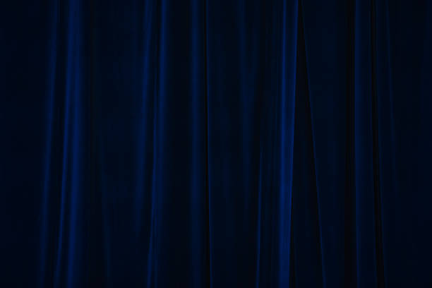 istock blue curtain in theatre. 1453831369