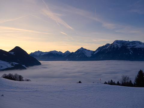 Austrian Alps landscape over clouds