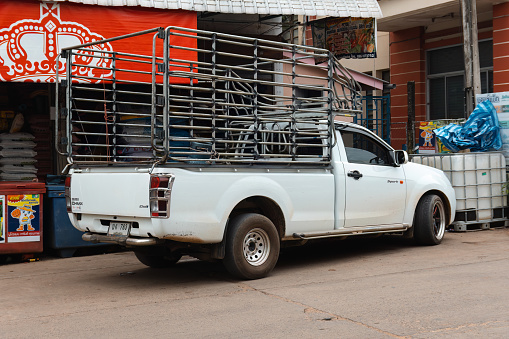 Pai, Thailand. November 19, 2022. White Isuzu D-Max truck with steel cage parked in Pai, Thailand