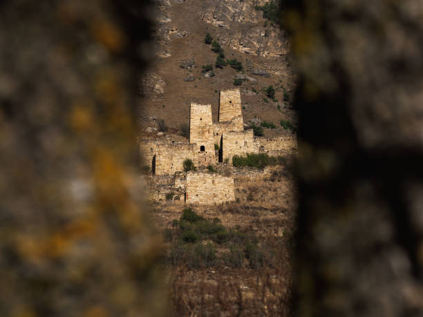 istock Selective focus. Medieval tower complex Egical, one of the authentic medieval castle-type tower villages, located on the extremity of the mountain range in Ingushetia, Russia. 1453832719