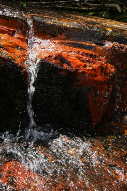 The riverbed at Quebrada de Jaspe in Venezuela consists of the red gemstone jasper