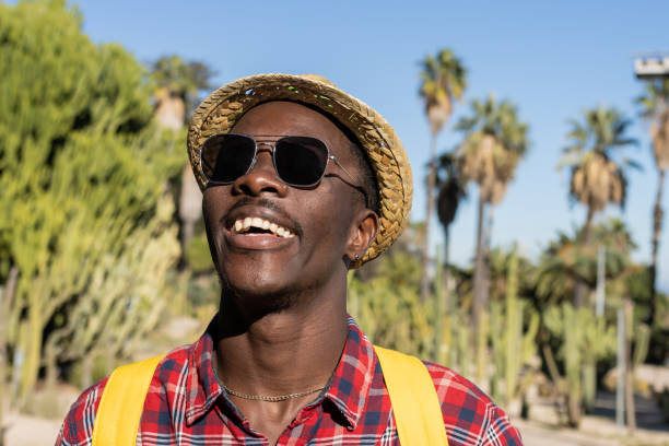 istock Smiling man in a botanical garden. 1453835361