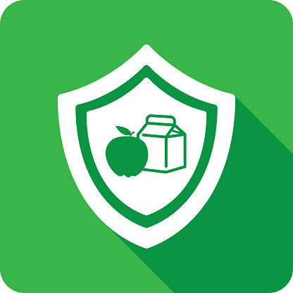 Vector illustration of a shield with apple and carton of milk icon against a green background in flat style.