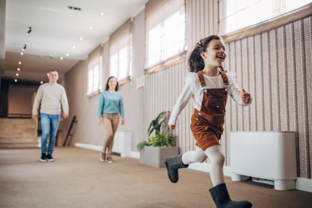 istock Family in hotel corridor 1453837236