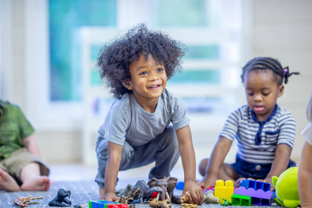 istock Toddlers Playing with Toys 1453837298
