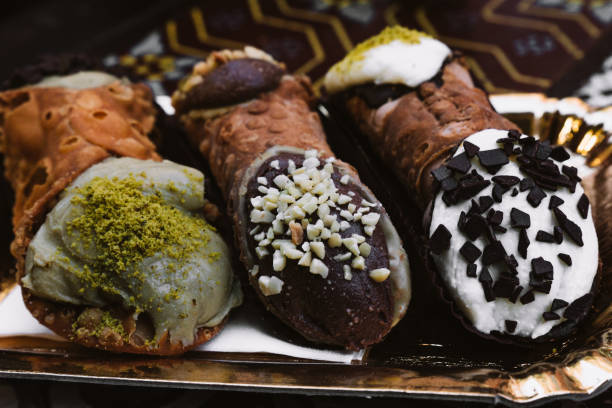 istock Cannoli with coffee. Typical Italian sweet 1453838653