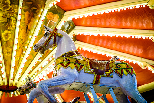 Munich, Germany - September 17: typical historic horse carousel at the oktoberfest in Munich on September 17, 2022