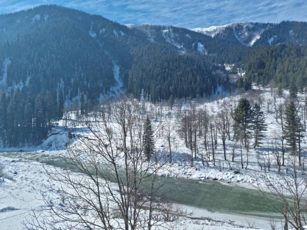istock river mountains of Himalaya views in winters 1453839735