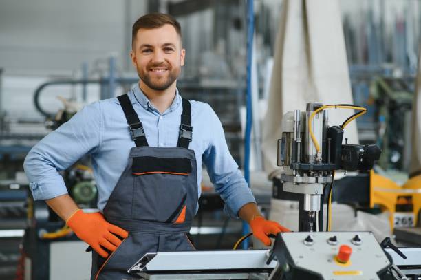 istock Factory worker. Man working on the production line. 1453843651