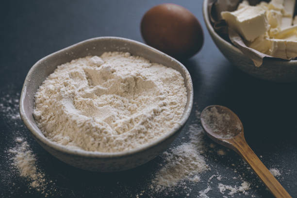istock Flour, butter and eggs on the kitchen table, close-up. 1453845521