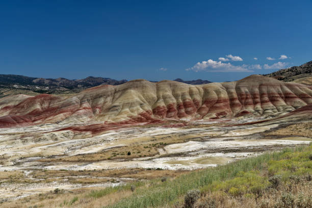 istock Peak of Painted Hills in the blue sky background 1453855464