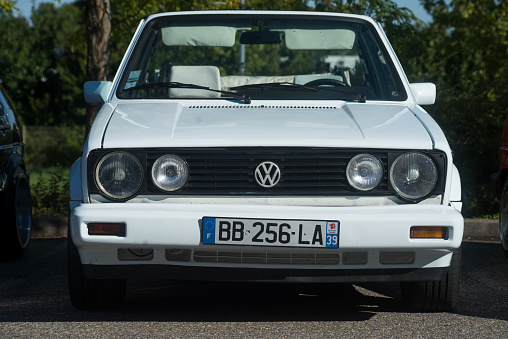 Mulhouse - France - 11 september 2022 - Closeup of white Volkswagen Golf Type 1 convertible parked in the street