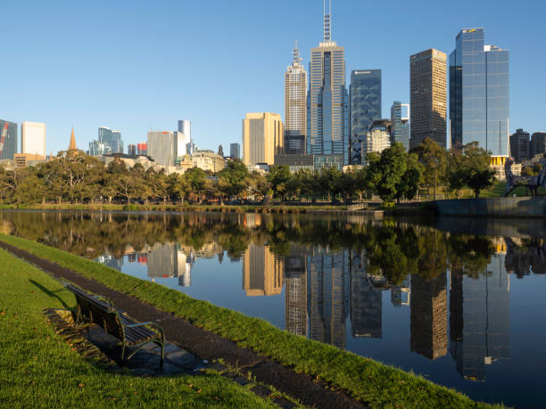 istock Chair next to river with skyline view 1453864876