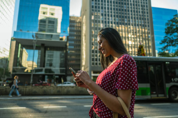 istock Business women using cell phone 1453868347