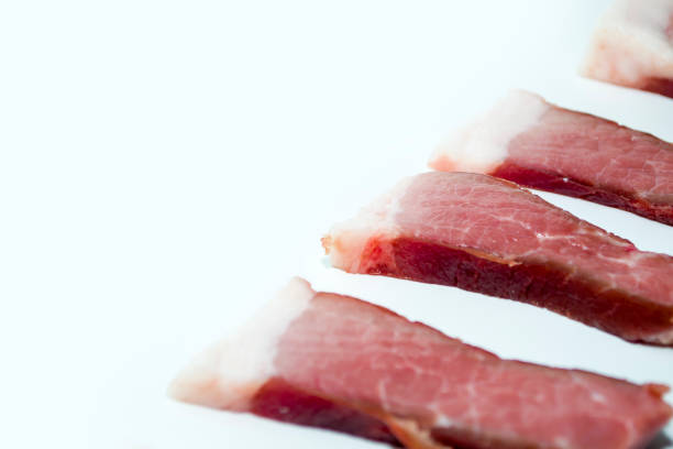 sliced pork bacon on a white background, copy space - meat strip steak steak supermarket imagens e fotografias de stock