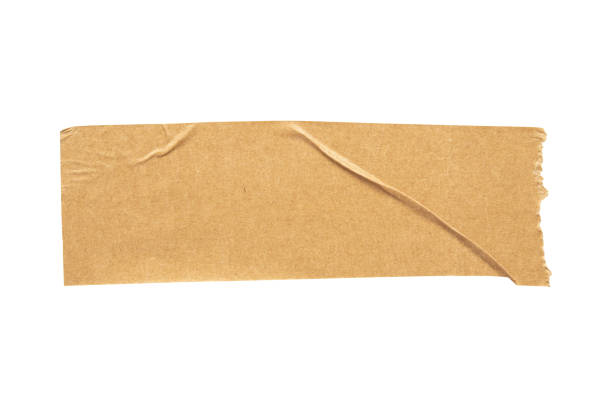 istock Brown adhesive paper tape isolated on white background 1453869598
