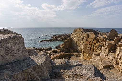 Bizarre sharp rock formation at Pointe de Castel Erek at the coast of the Cote de Granit Rose near Tregastel, Brittany, France