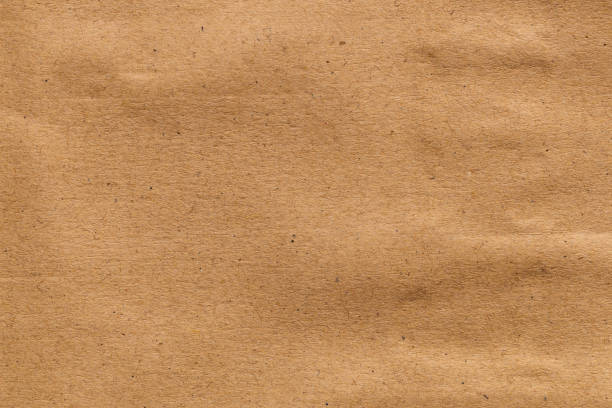 istock Brown paper sheet texture cardboard background. 1453874401