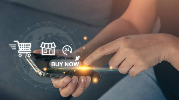 istock Person touching virtual screen makes a purchase online shopping application on mobile. 1453875759