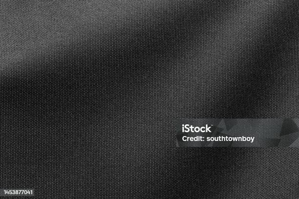 Black Color Sports Clothing Fabric Football Shirt Jersey Texture And Textile Background Stock Photo - Download Image Now