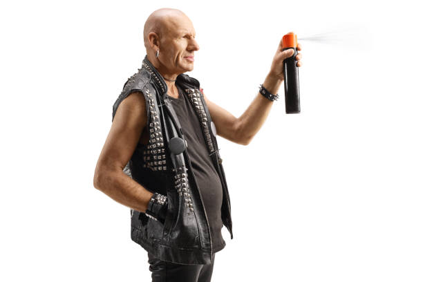 istock Profile shot of a punk using a spray can 1453877946