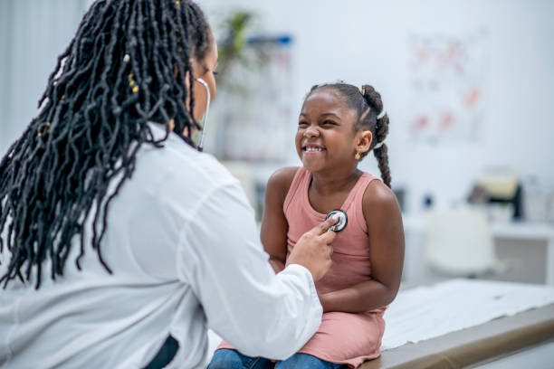 istock Little Girl at the Doctors 1453878795