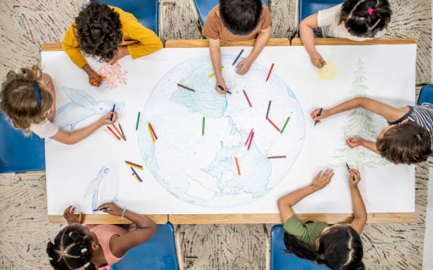 istock Children Coloring a Poster 1453878813