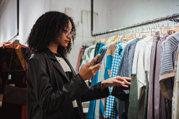istock Woman showing clothes over video call 1453879588