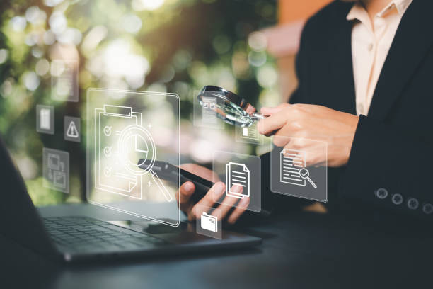 istock Businessman Audit documents, quality assessment management With a checklist, business document evaluation process, market data report analysis and consulting, plan review process. 1453880099