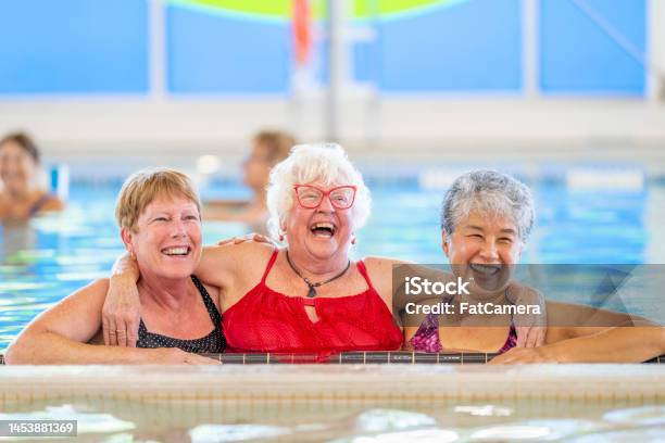 Senior Water Aerobics Class Stock Photo - Download Image Now - Fun, Swimming, Learning