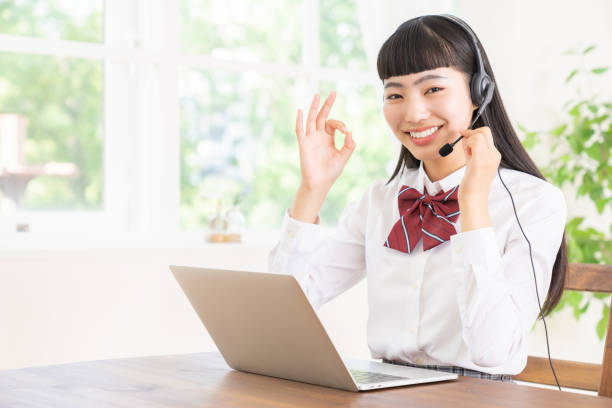 istock girl student ,laptop computer,correspondence course,School uniform, 1453884287