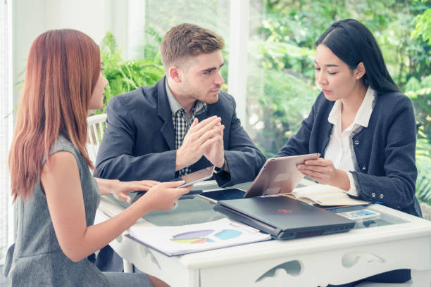 istock Creative design office center working teamwork. Happy business people partner plan strategy organization research people together at diversity office using laptop, smartphone company conference room 1453886383