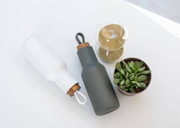istock Modern water bottles on desk 1453888710