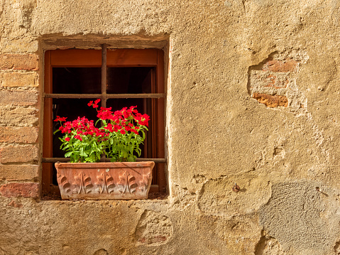 Door and window features of apartments along the streets of Pienza in Tuscany Italy