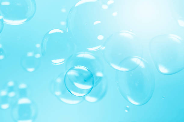 istock Freshness of Transparent Blue Soap Bubbles Abstract Background. Soap Sud Bubbles Water. 1453900443