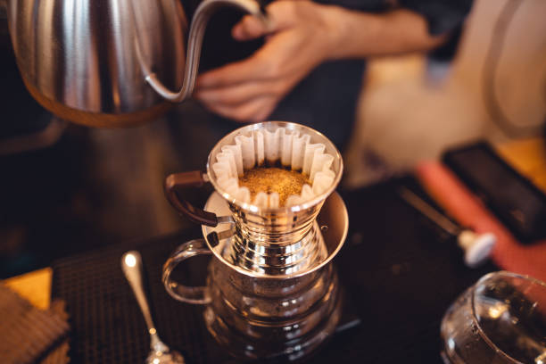 istock Close up of hand brewing coffee 1453904940
