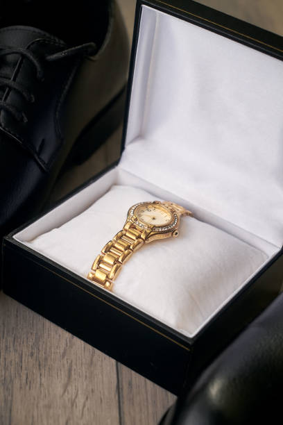 istock Stylish women's watch in a gift box, close-up. 1453910826