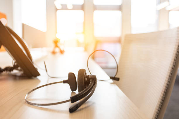 istock headphones telephone in call center 1453914852