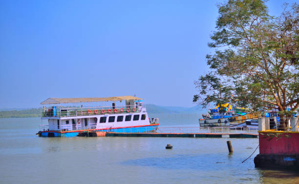 istock A ferry parked at a jetty over Zuari river in Goa. 1453914915