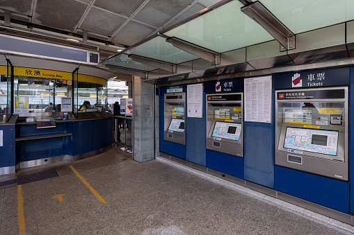 Hong Kong - January 2, 2023 : Ticket machines at the MTR Sunny Bay Station in Lantau Island, Hong Kong. The station is an interchange station between the Tung Chung line and the Disneyland Resort line to Hong Kong Disneyland.