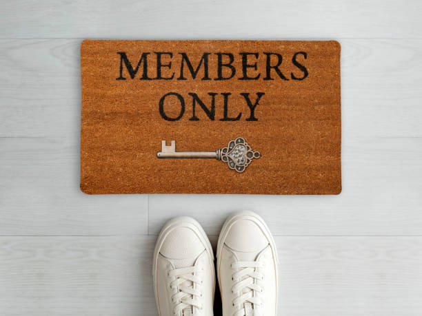 istock Designer Welcome Entry Doormat Placed on White Floor with White Shoes 1453920185