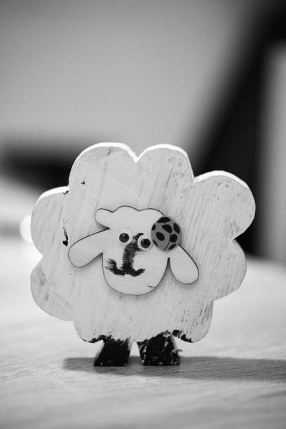 Grayscale of a wooden sheep