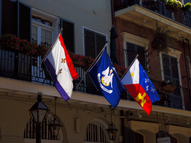 istock New Orleans and Louisiana flags 1453926088