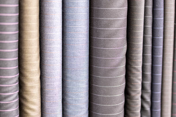 istock Bolts of fabric for making suits by a tailor 1453926401